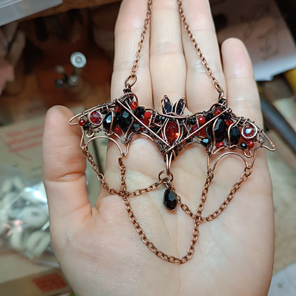 For Paige. Scarlett and black bat necklace