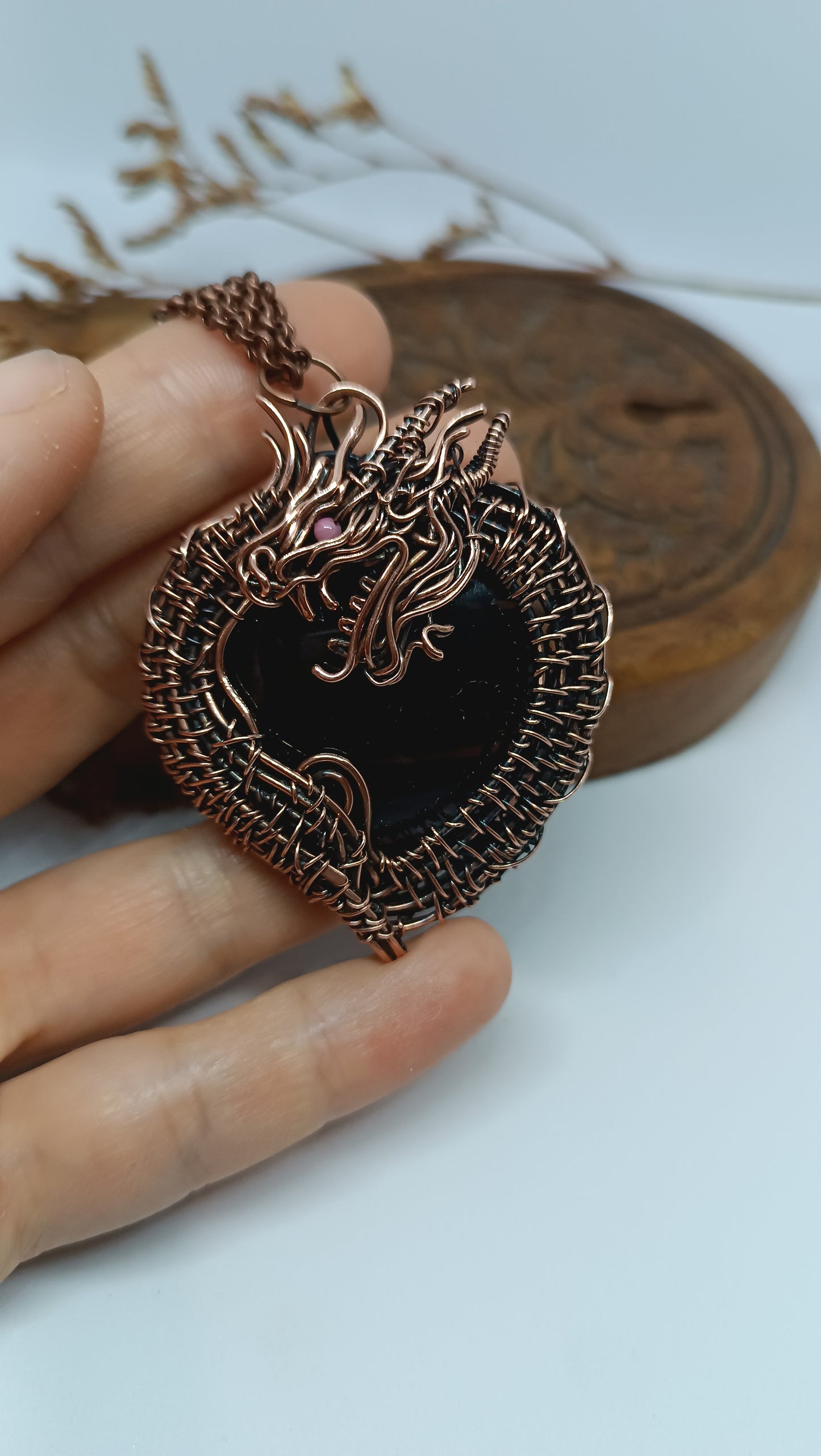 Black obsidian dragon pendant.