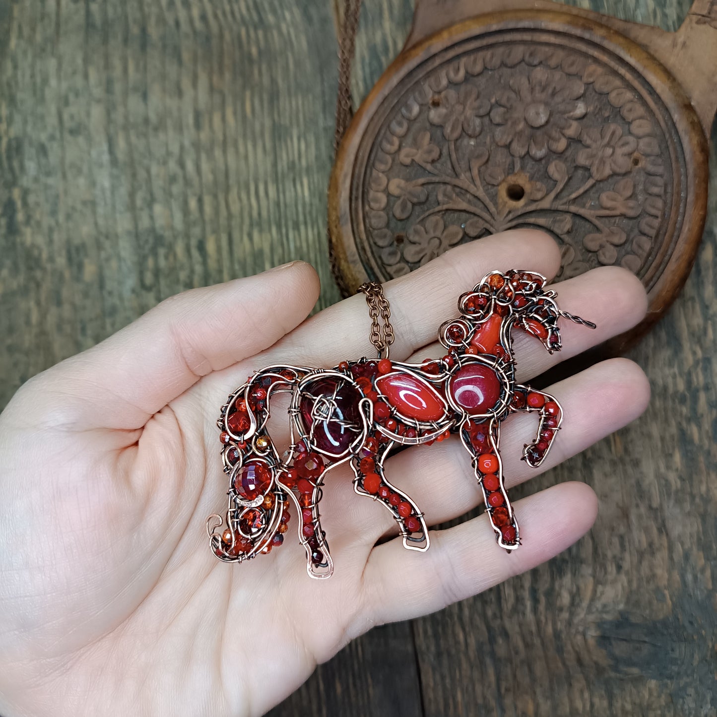 Red horse pendant.