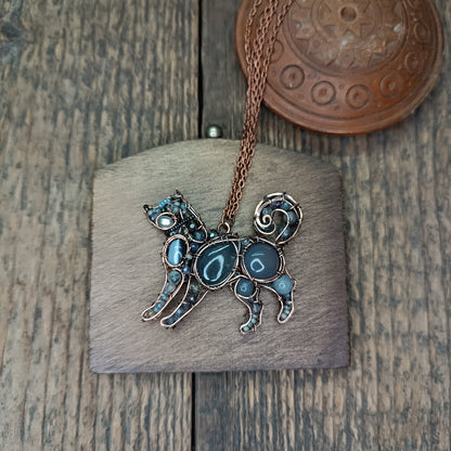 Sweet puppy. Detailed wire wrapped and beaded pendant.