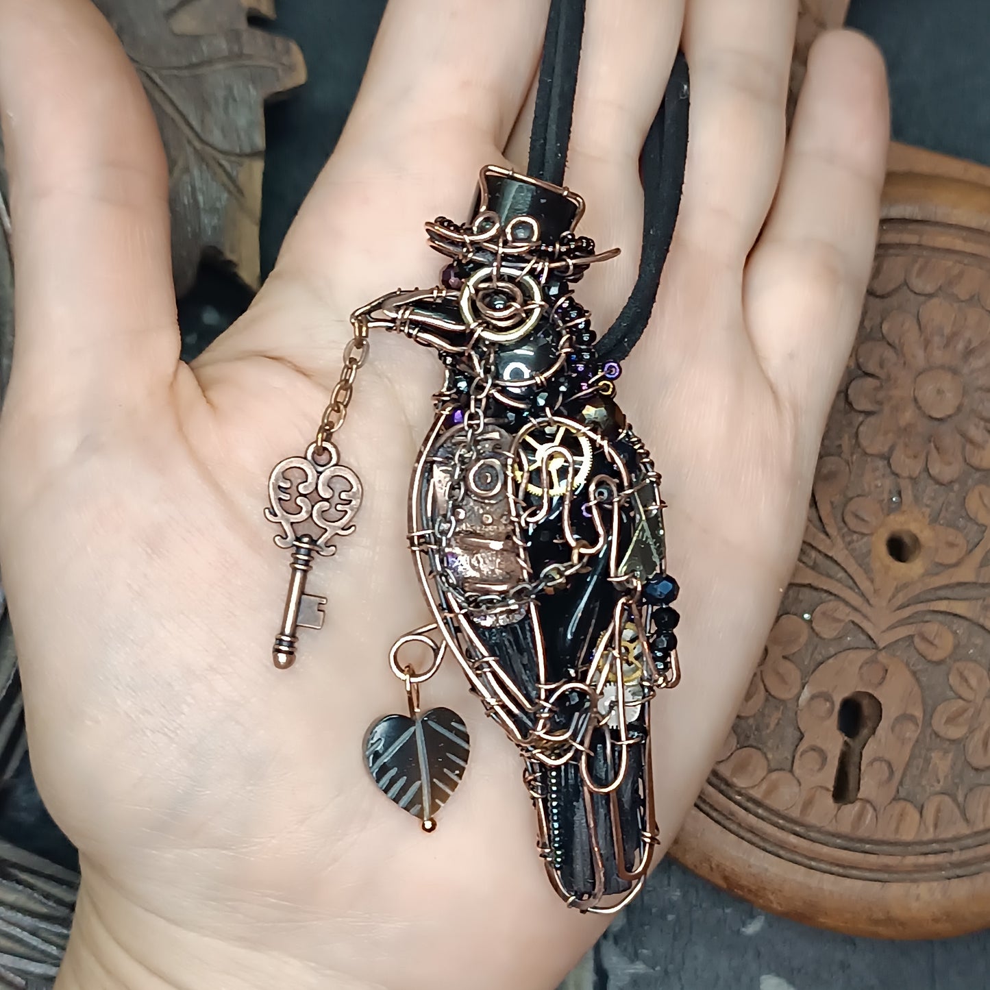 Steampunk raven necklace.