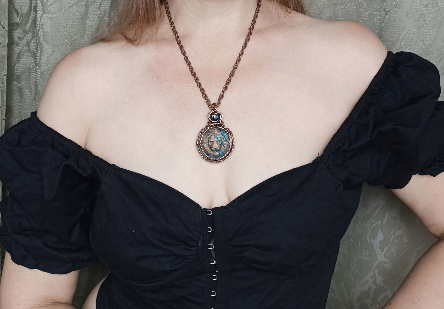 Carved leo labradorite necklace.