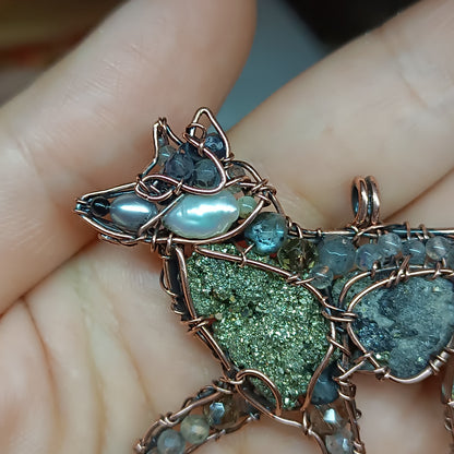 For Julia. Wolf pendant