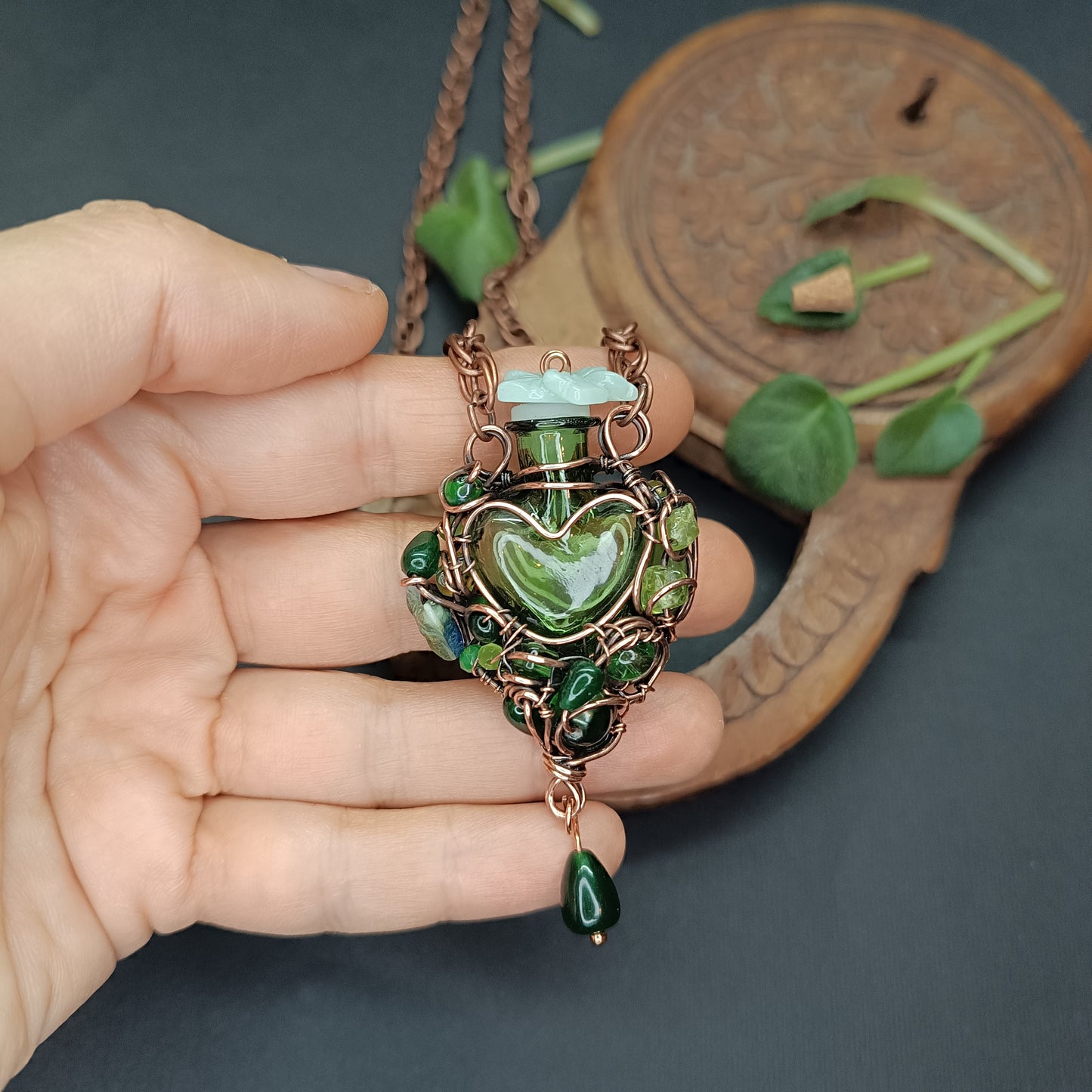Green heart vial necklace