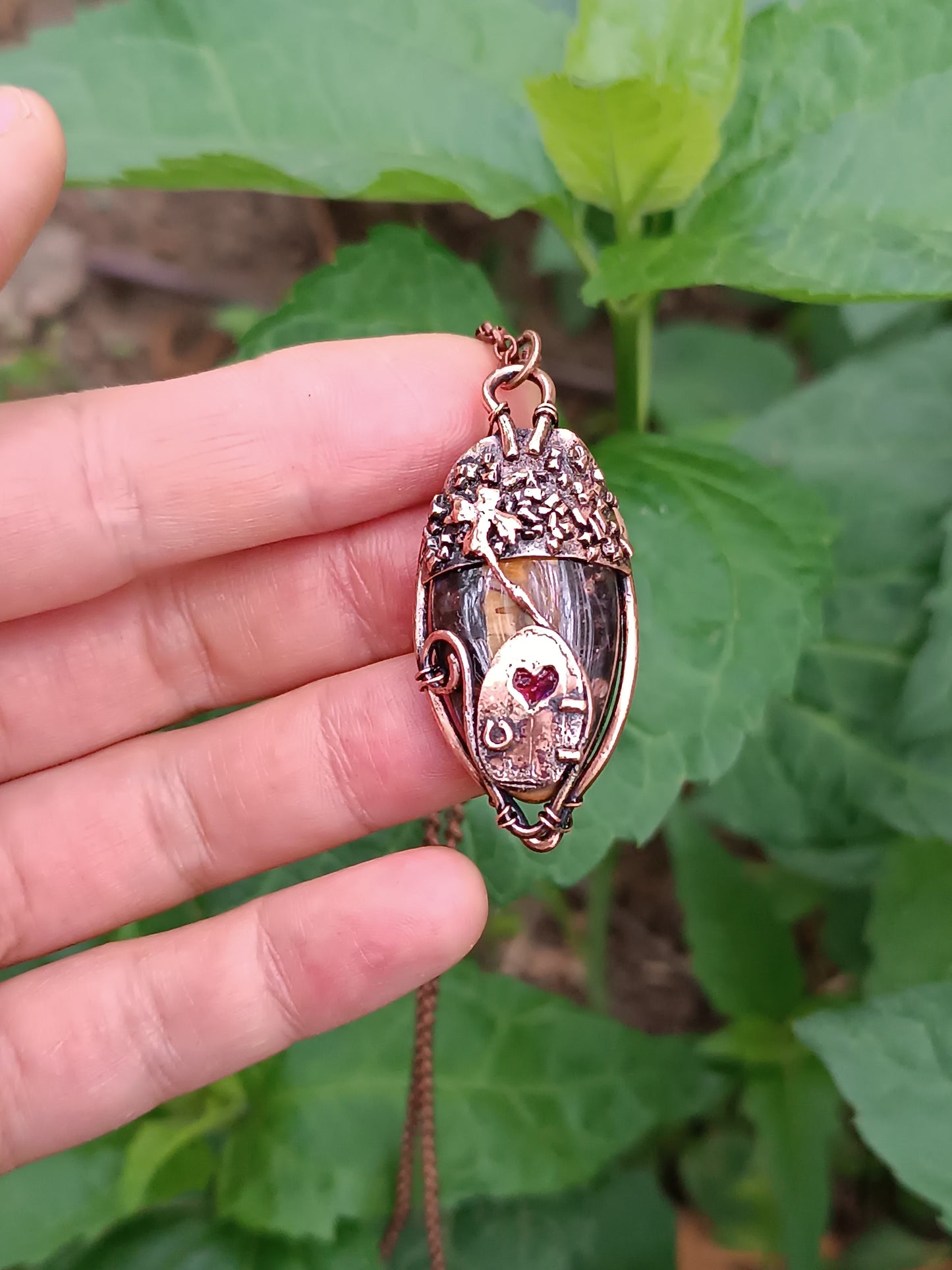 Acorn fairy house pendant.