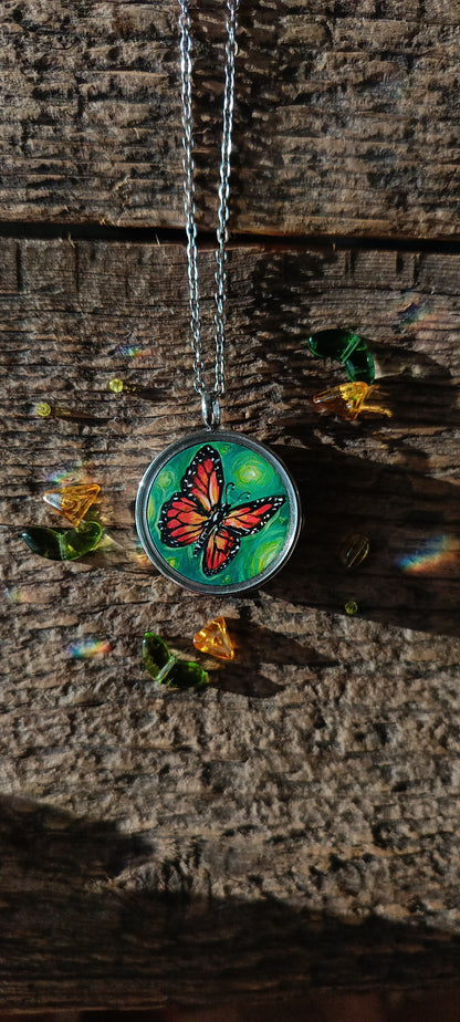Cat admiring butterflies. Pendant.