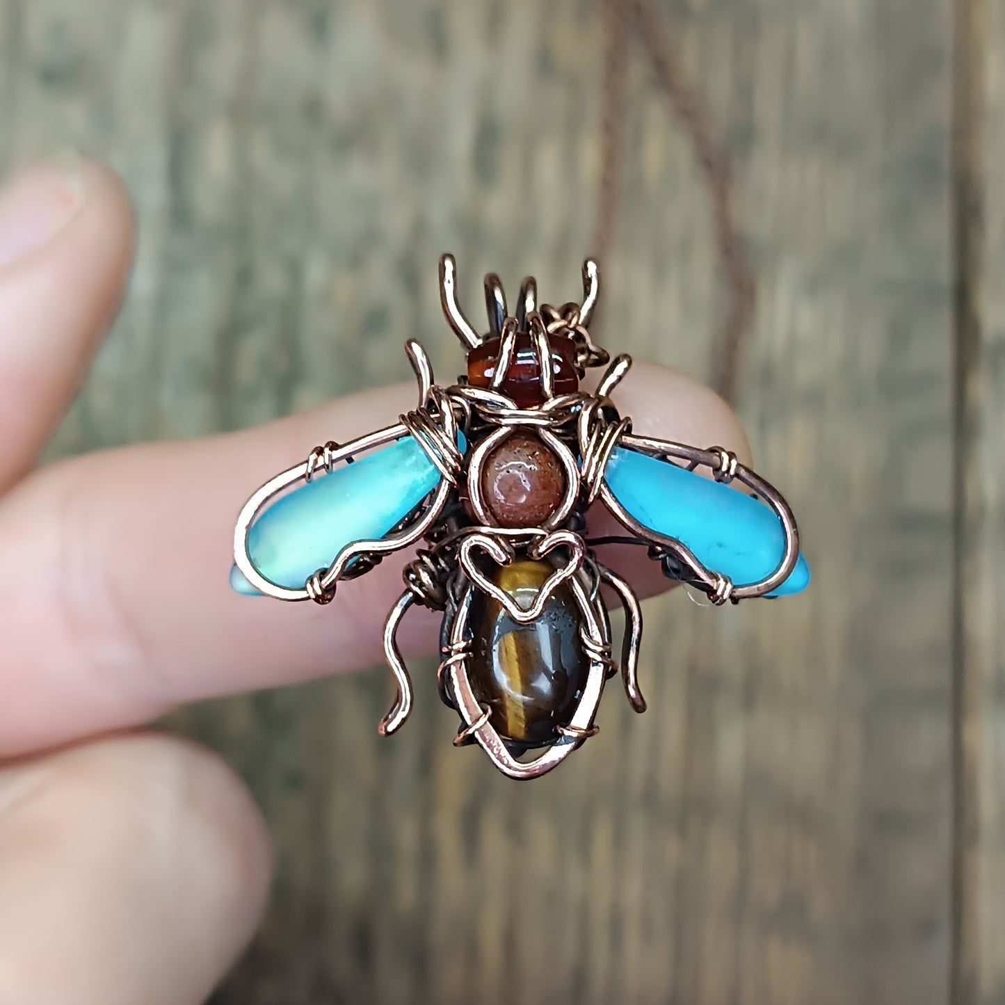 Little blue winged bee charm