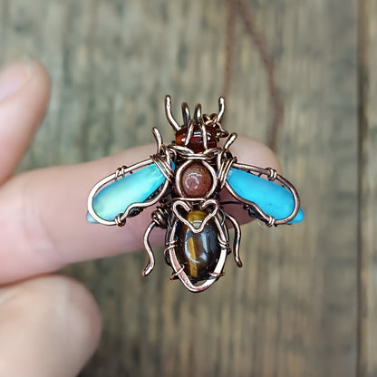 Little blue winged bee charm