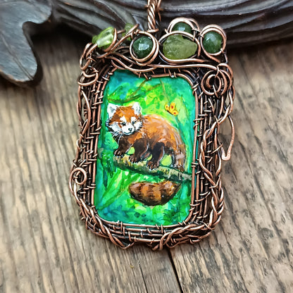 Red panda and a butterfly necklace. Reversible.