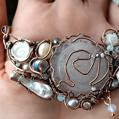 First snow. Rose necklace.