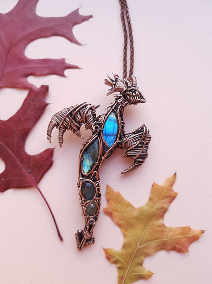 Dancing in the sky. Blue dragon with open wings. Copper pendant.