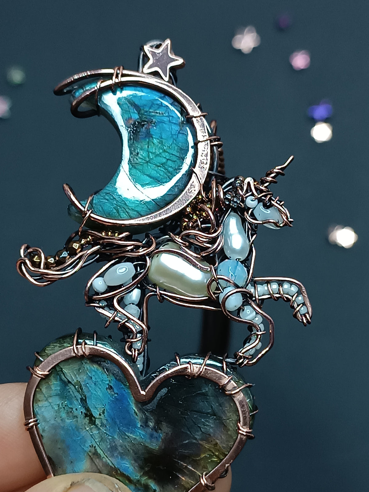 Space unicorn necklace.