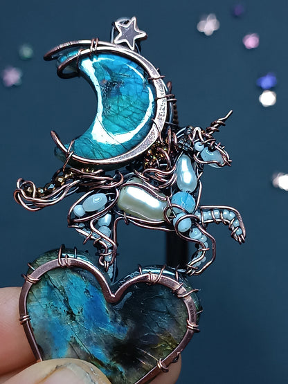 Space unicorn necklace.