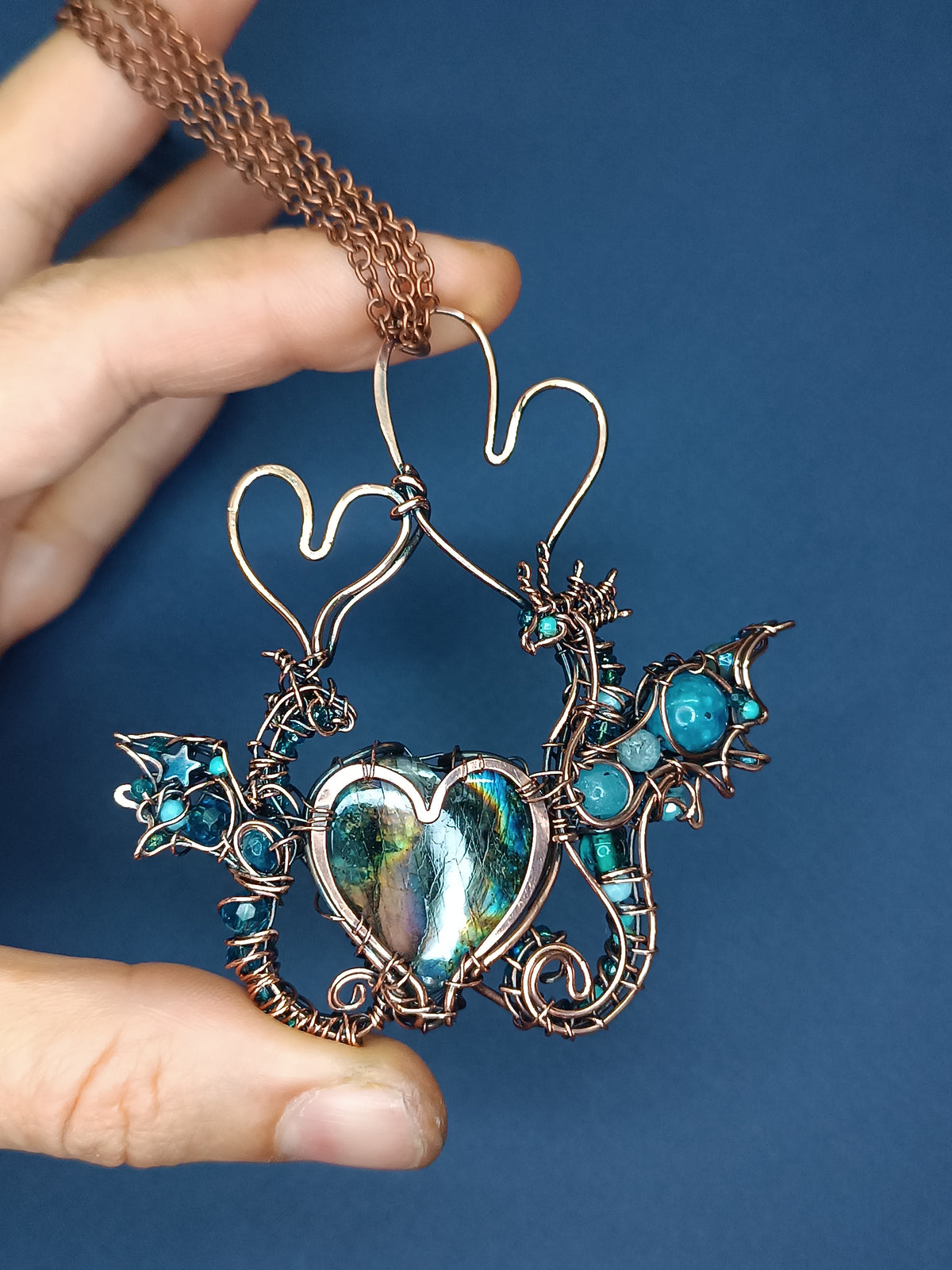 "Love you!" Dragons necklace.