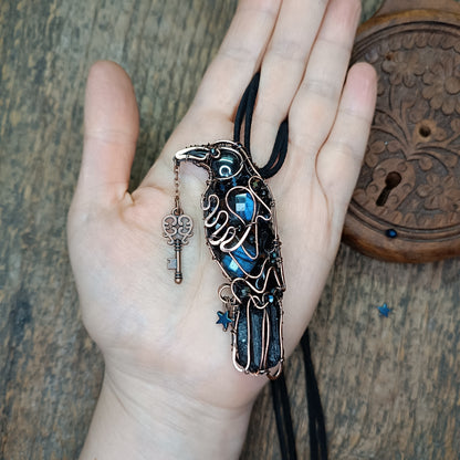 Secret keeper. Raven with the blue star. Wire wrapped necklace