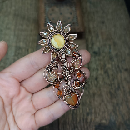 Sunflower pendant with carnelian heart root