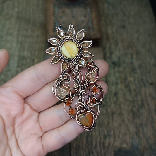 Sunflower pendant with carnelian heart root