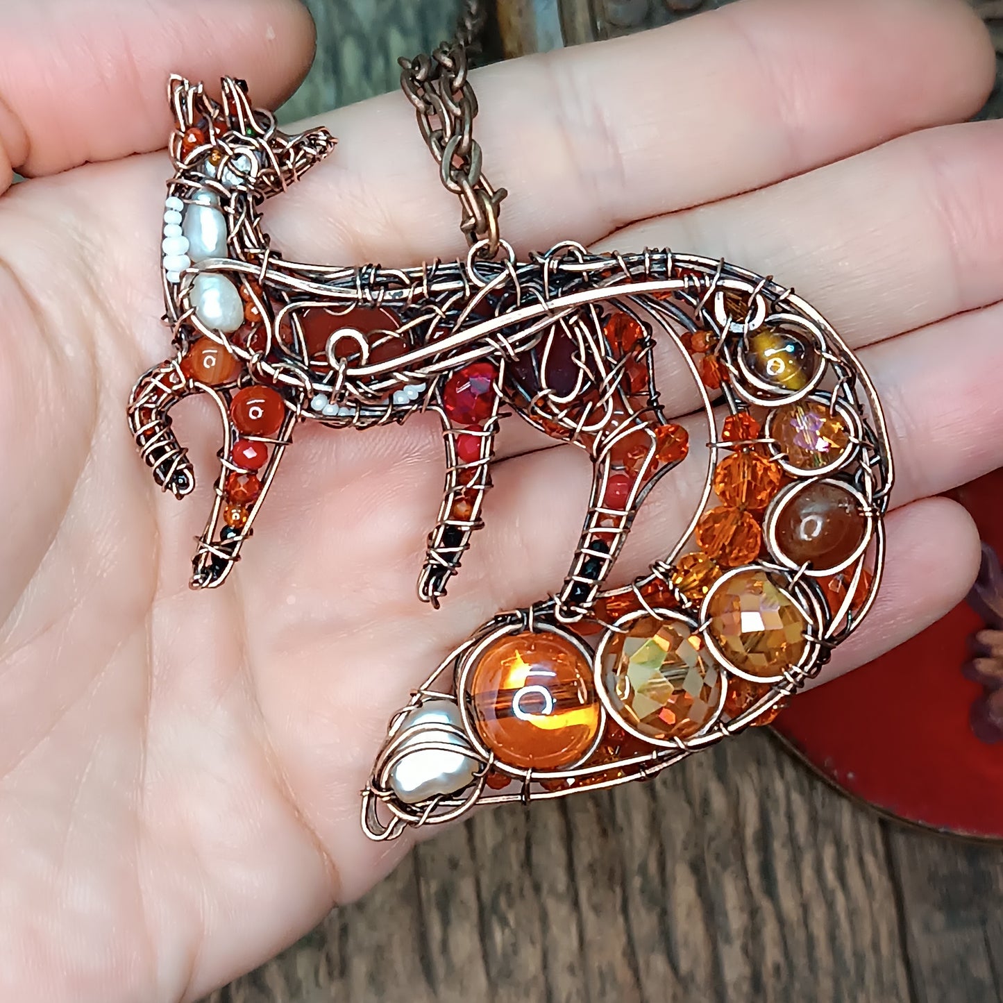 Swoopy tail Foxy. Sparkly wire wrapped pendant.