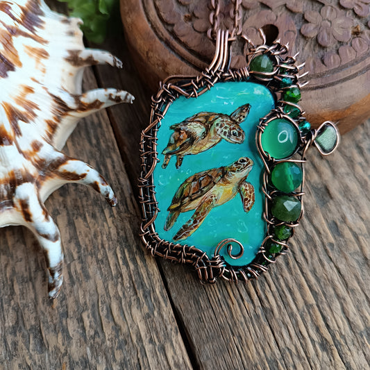 Aquatic adventure 🐢🦦 Hand painted wire wrapped necklace. 2 sided.