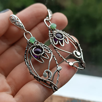 Silver dangling earrings. Amethyst bells.
