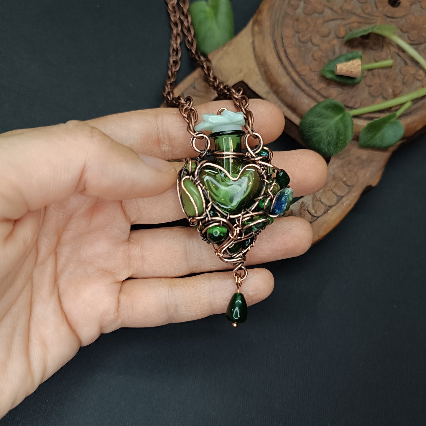 Green heart vial necklace