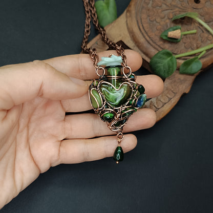 Green heart vial necklace