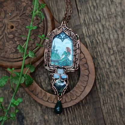 The ballad of white unicorn and princess. Wire wrapped necklace with miniature paintings.