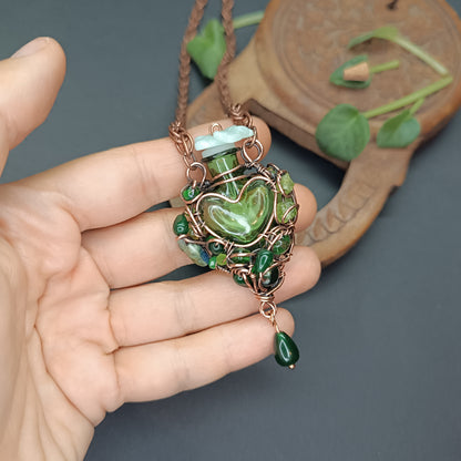 Green heart vial necklace