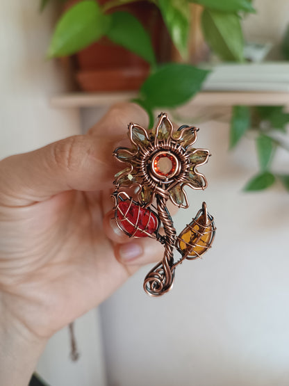 Sunflower pendant with red leaf