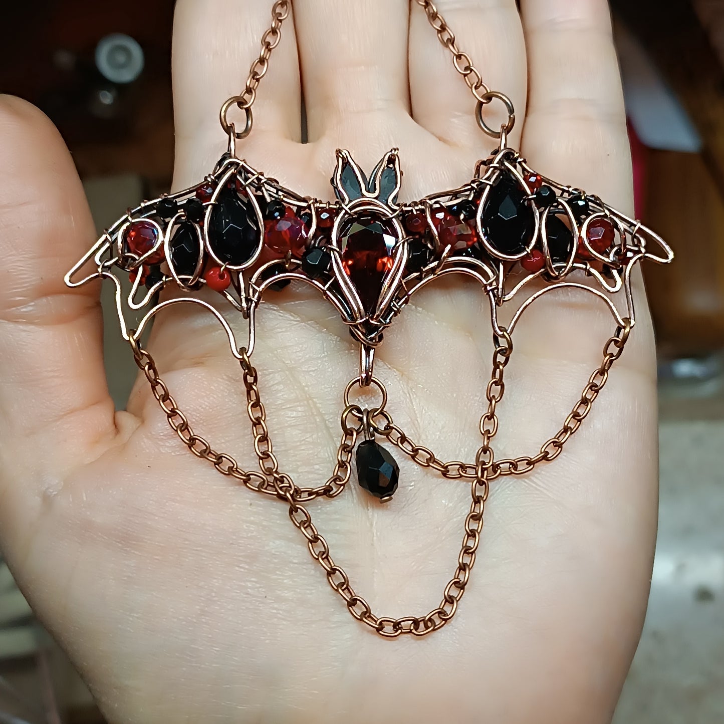 For Paige. Scarlett and black bat necklace