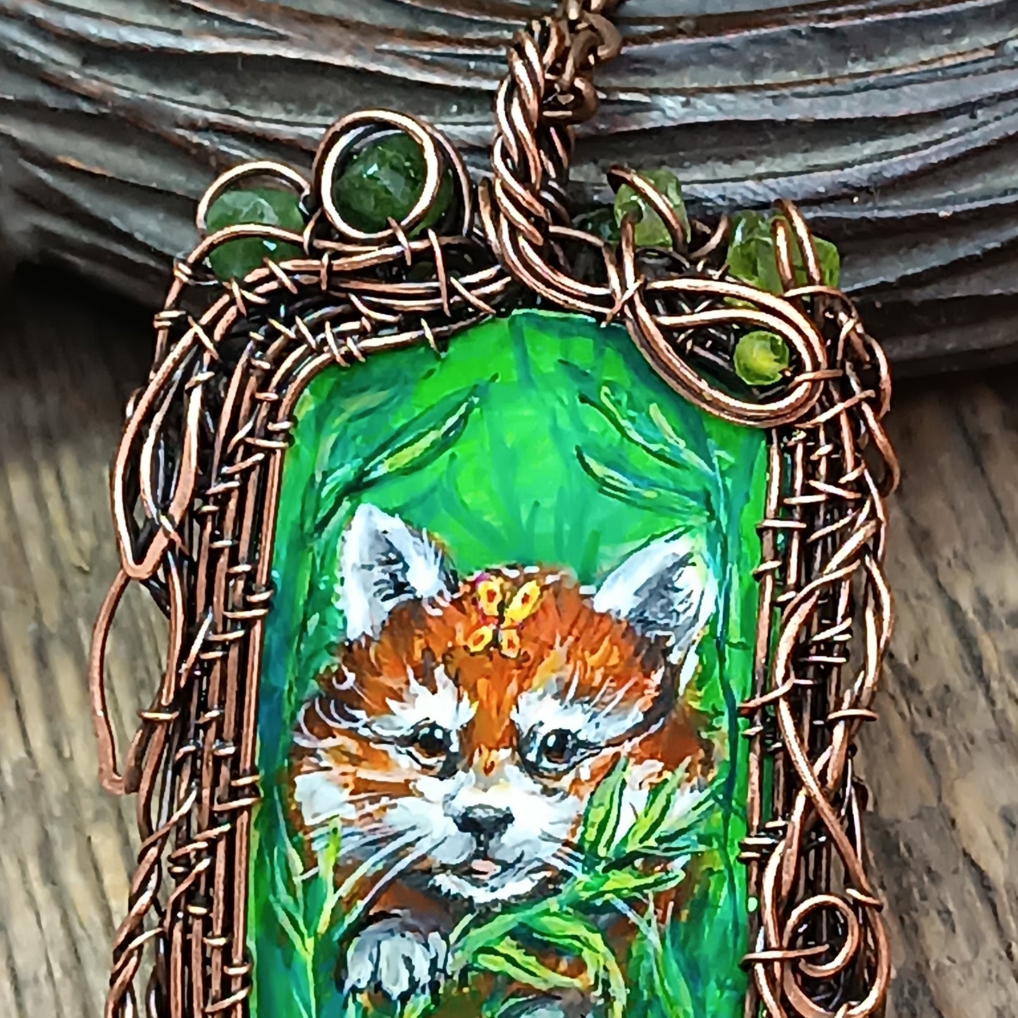 Red panda and a butterfly necklace. Reversible.