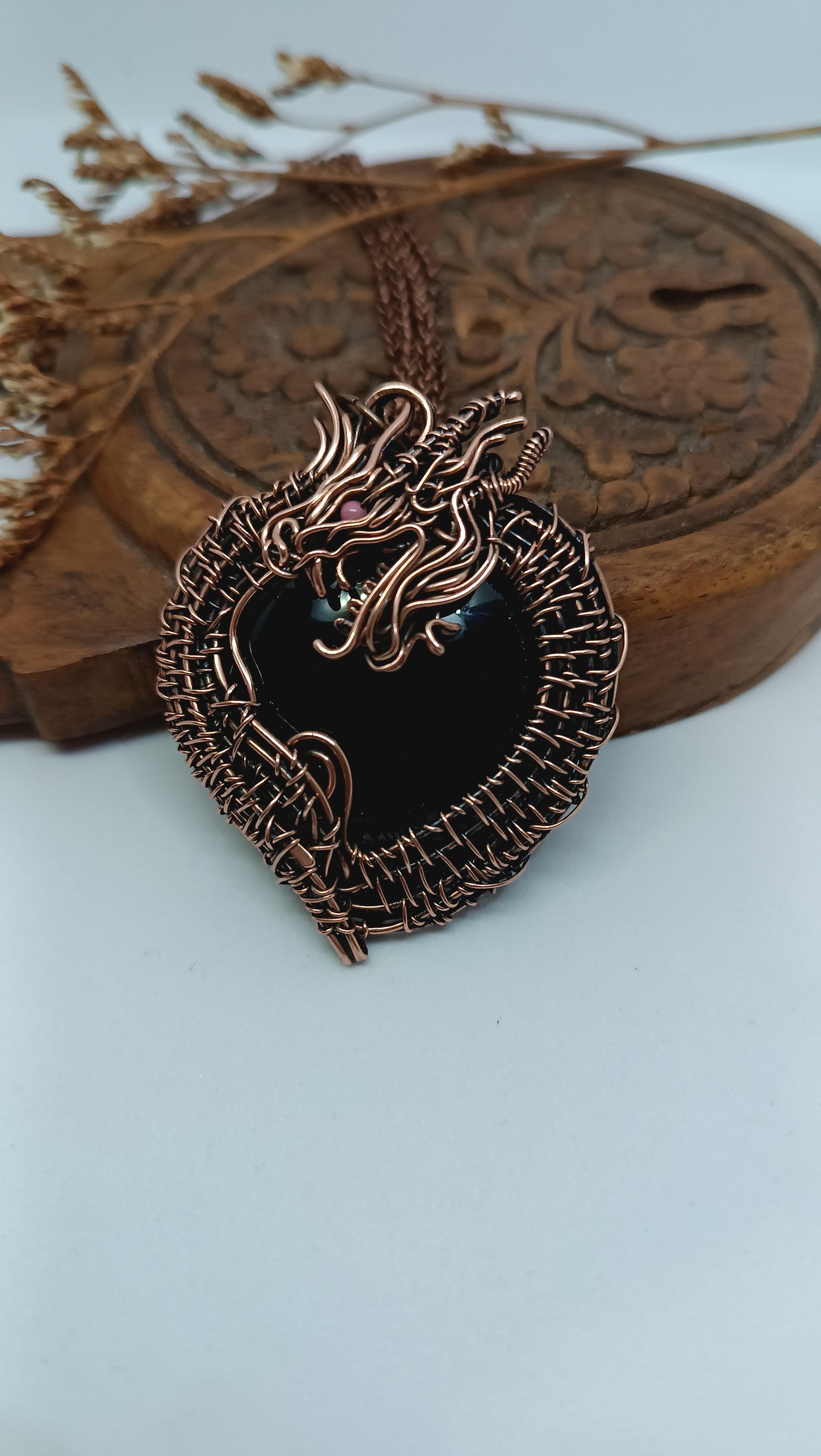 Black obsidian dragon pendant.