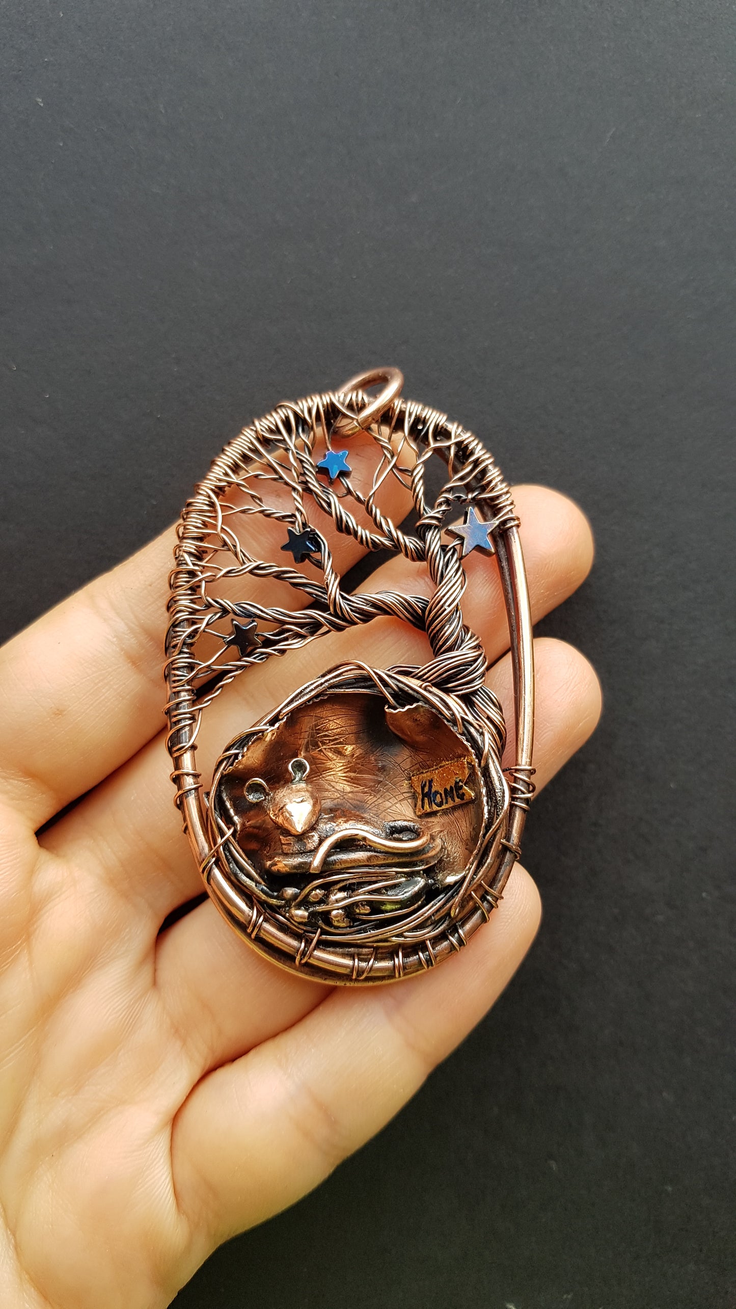 Mouse in the nest necklace.