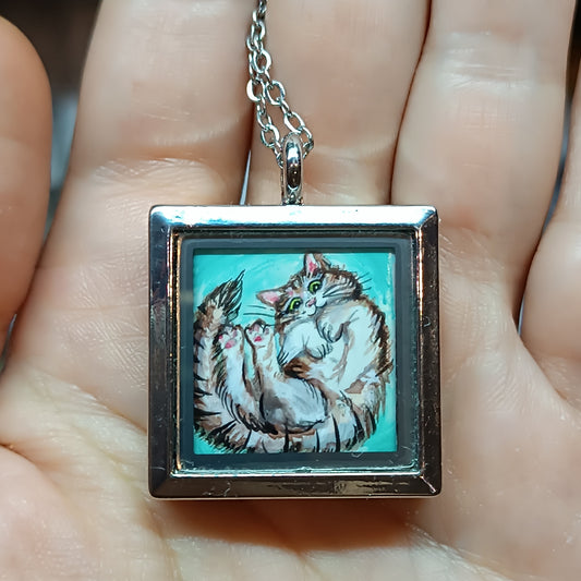 Cats in the box! Hand painted pendant. Reversible.