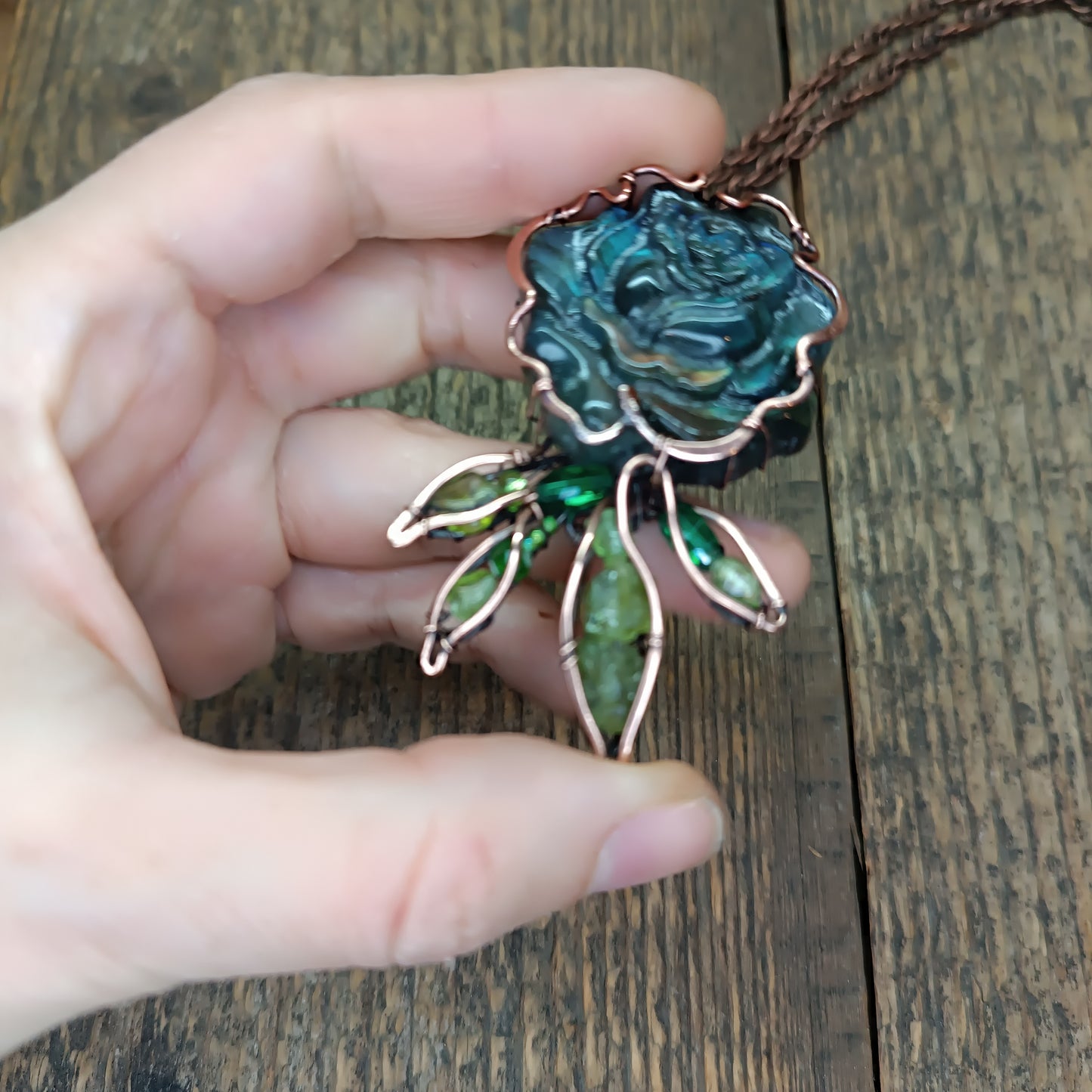 Blue rose with hidden rainbows. Necklace.