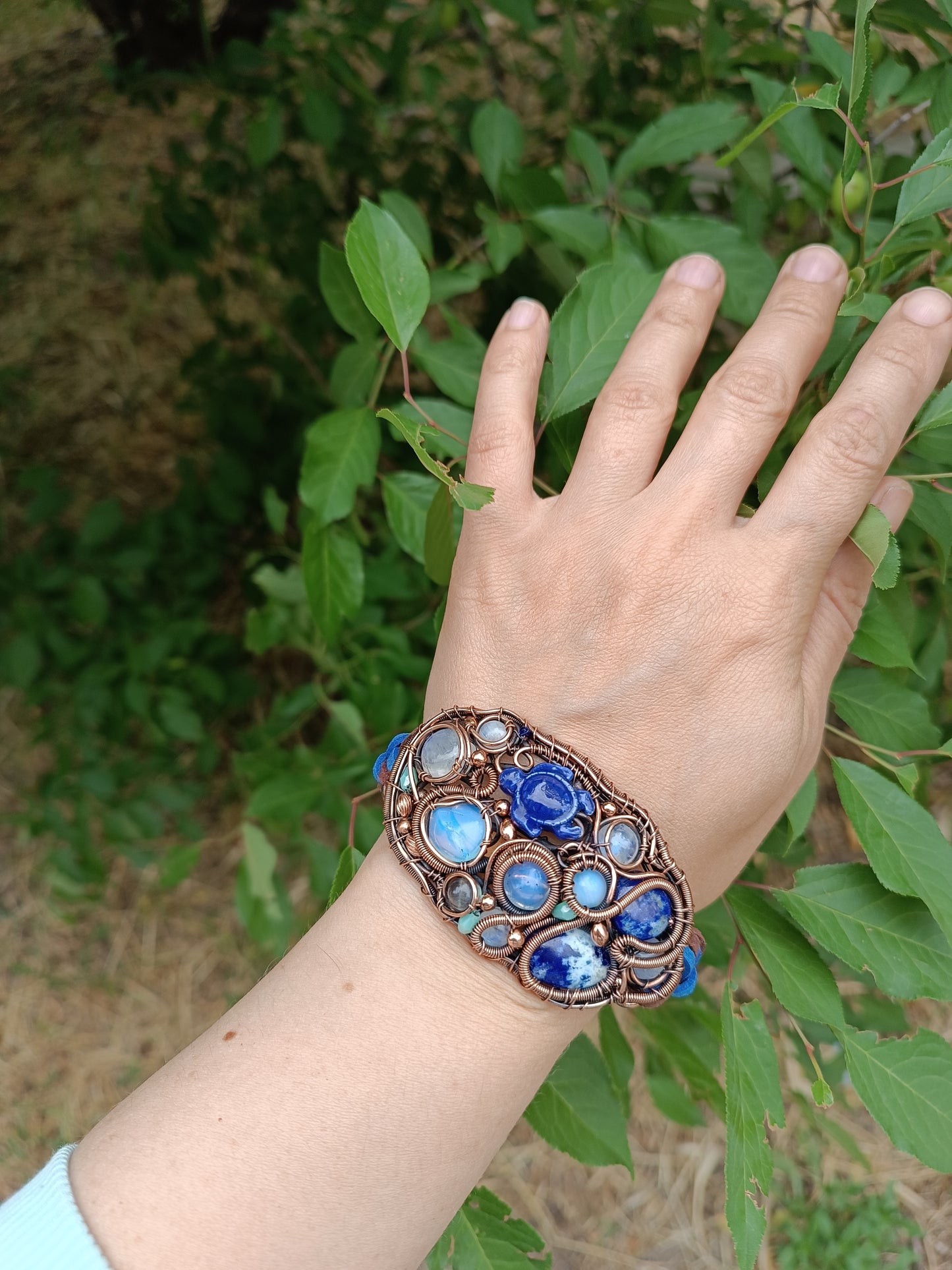 Wire wrapped bracelet with sea turtle