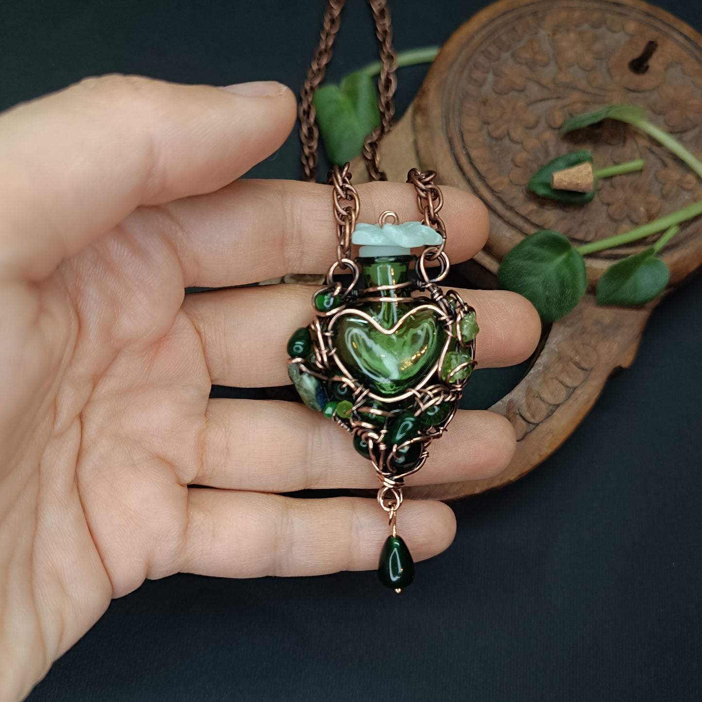 Green heart vial necklace