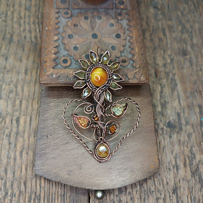 Sunflower pendant with citrine root.