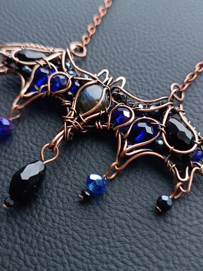 Midnight whisper. Bat necklace.