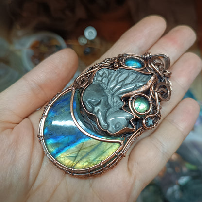 Winged kitty sleeping on the moon