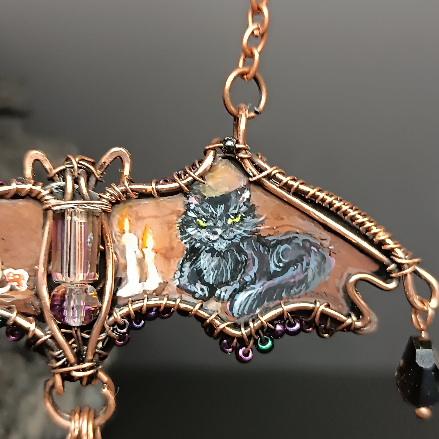 Halloween story. Painted bat necklace