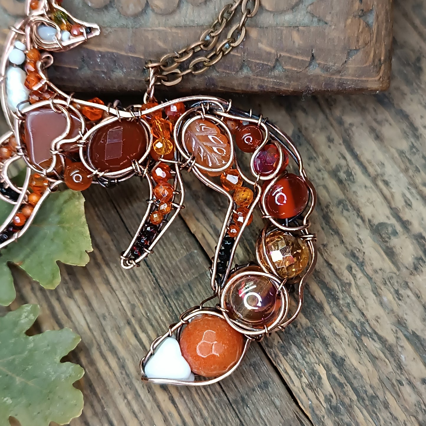 Foxy the swoopy tail! Copper necklace with carnelians.