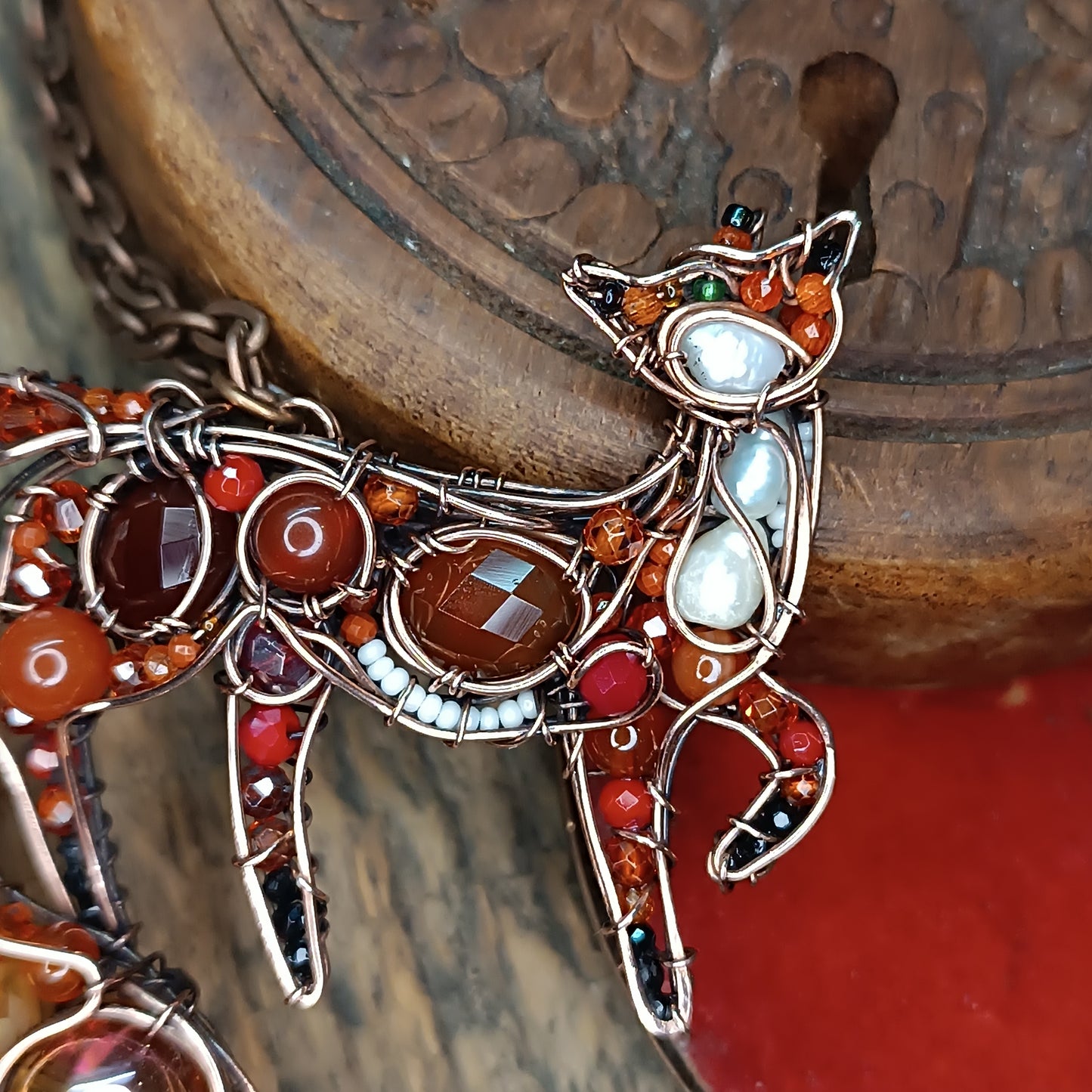 Swoopy tail Foxy. Sparkly wire wrapped pendant.