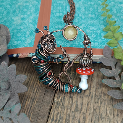 Blue caterpillar necklace