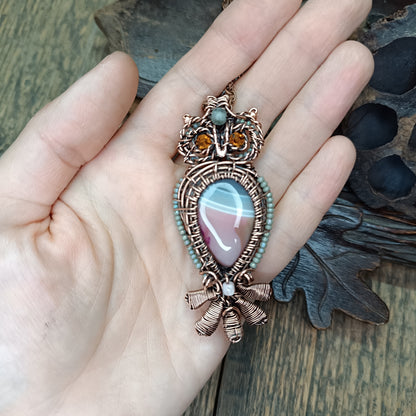 Owl necklace.