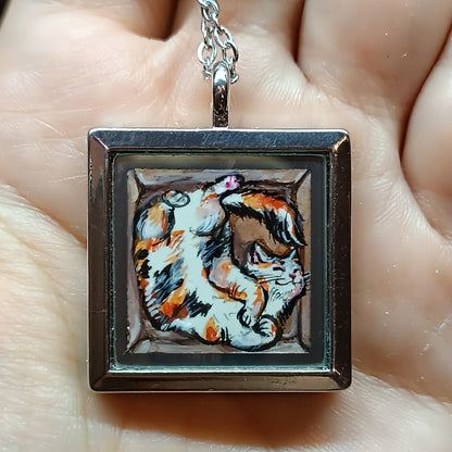 Cats in the box! Hand painted pendant. Reversible.