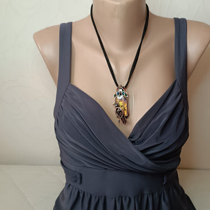 Raven on the stained glass window necklace