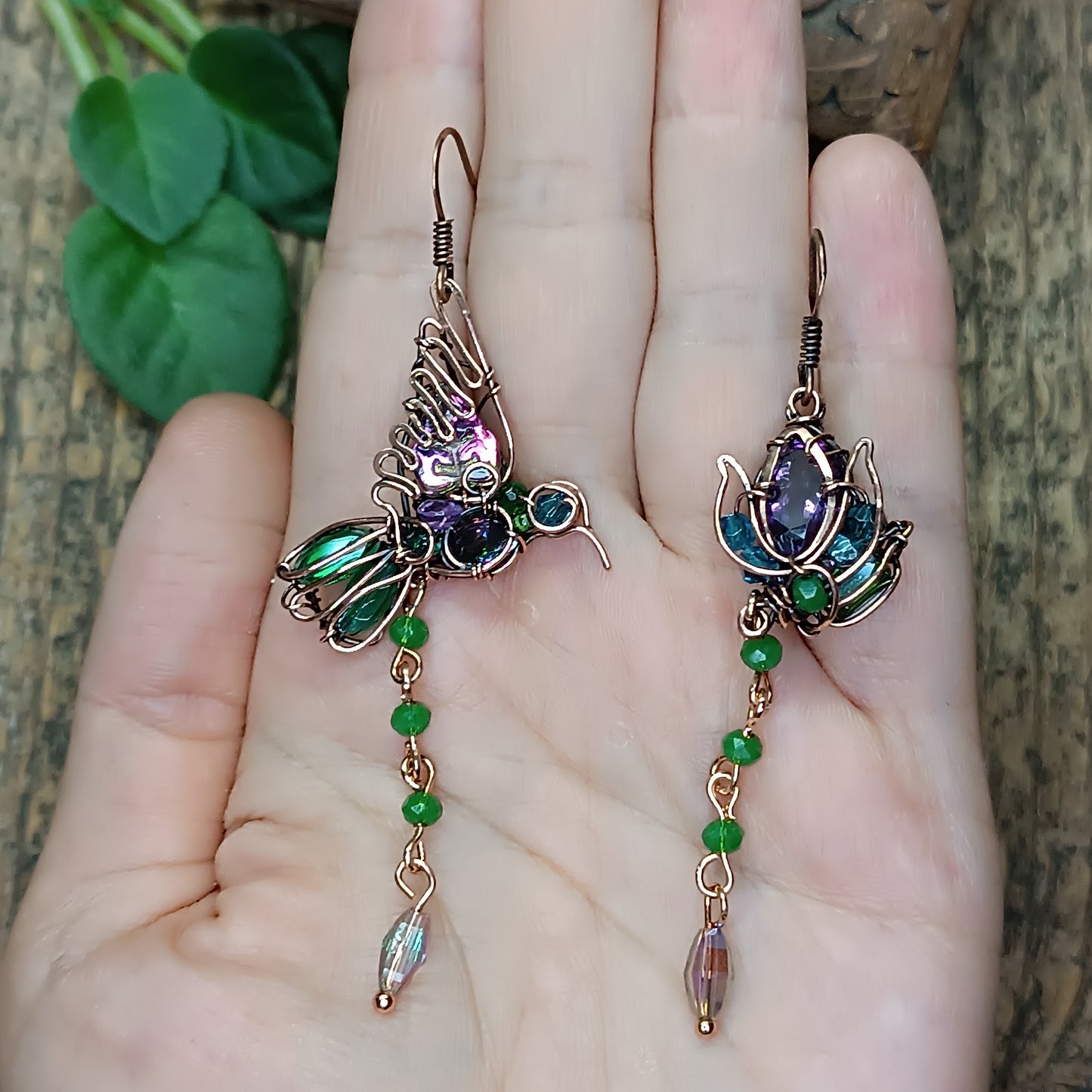 Humming bird and flower dangling earrings.