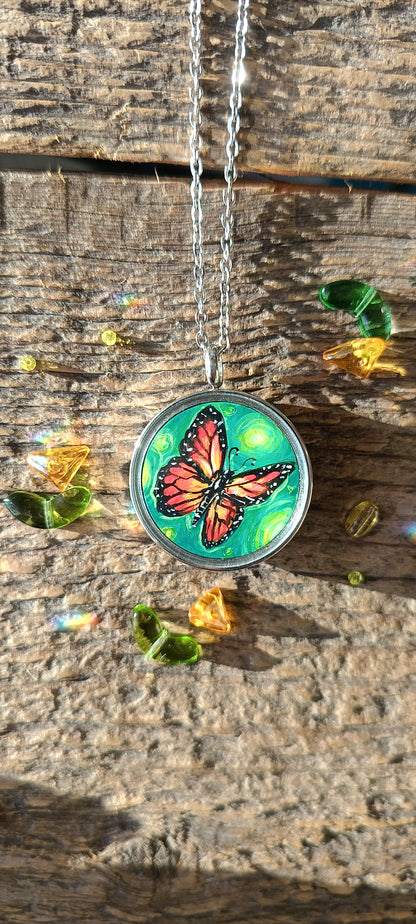 Cat admiring butterflies. Pendant.