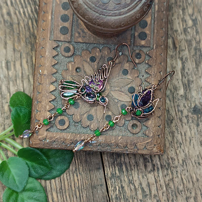 Humming bird and flower dangling earrings.